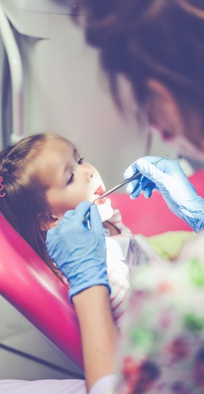 pediatric-dentist-little-girl-reception-dentist